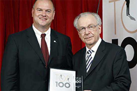 Receiving award from Prime Minister Lothar Späth