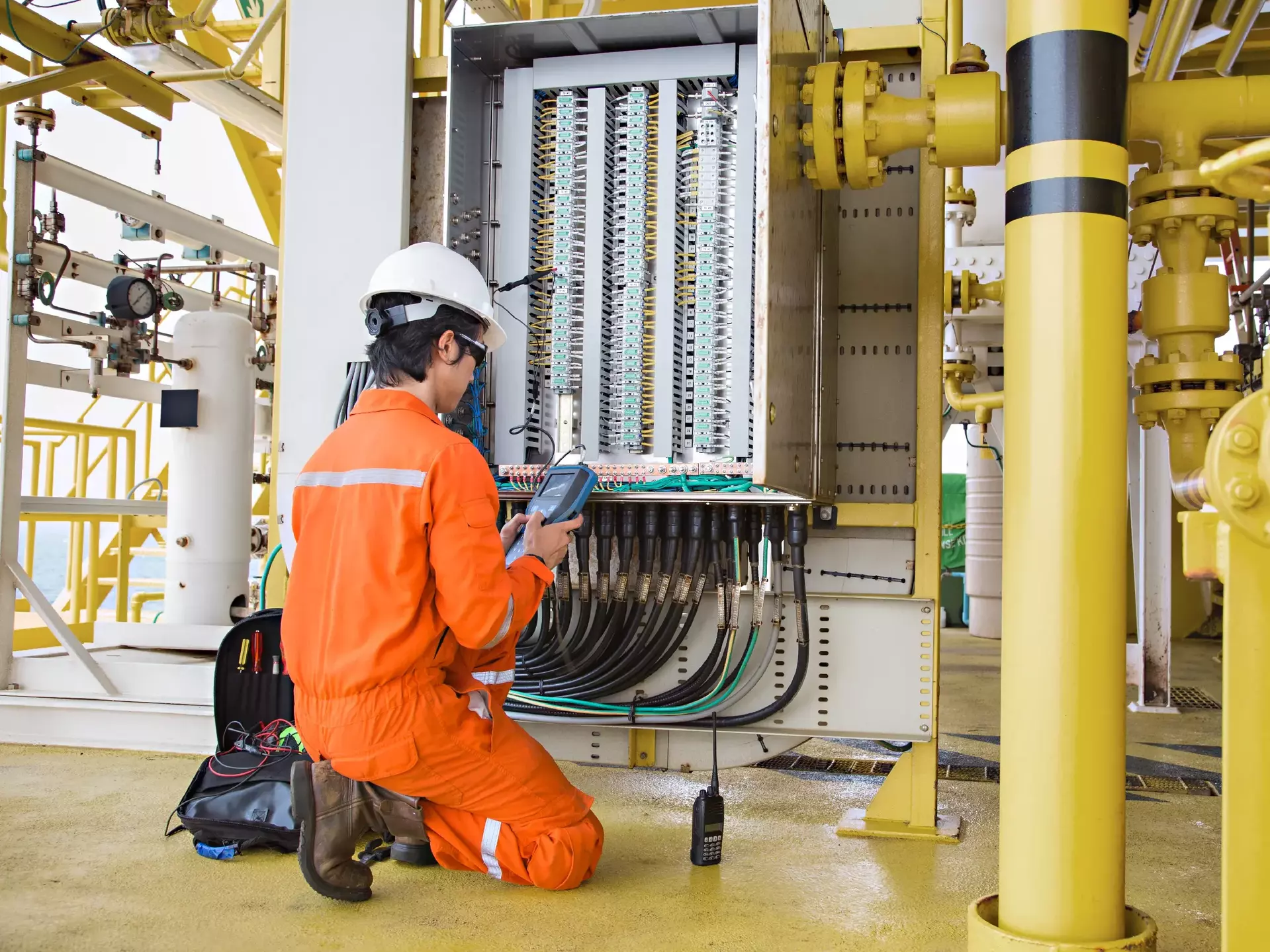 Electrical and instrument technician maintenance electric system at oil and gas processing platform