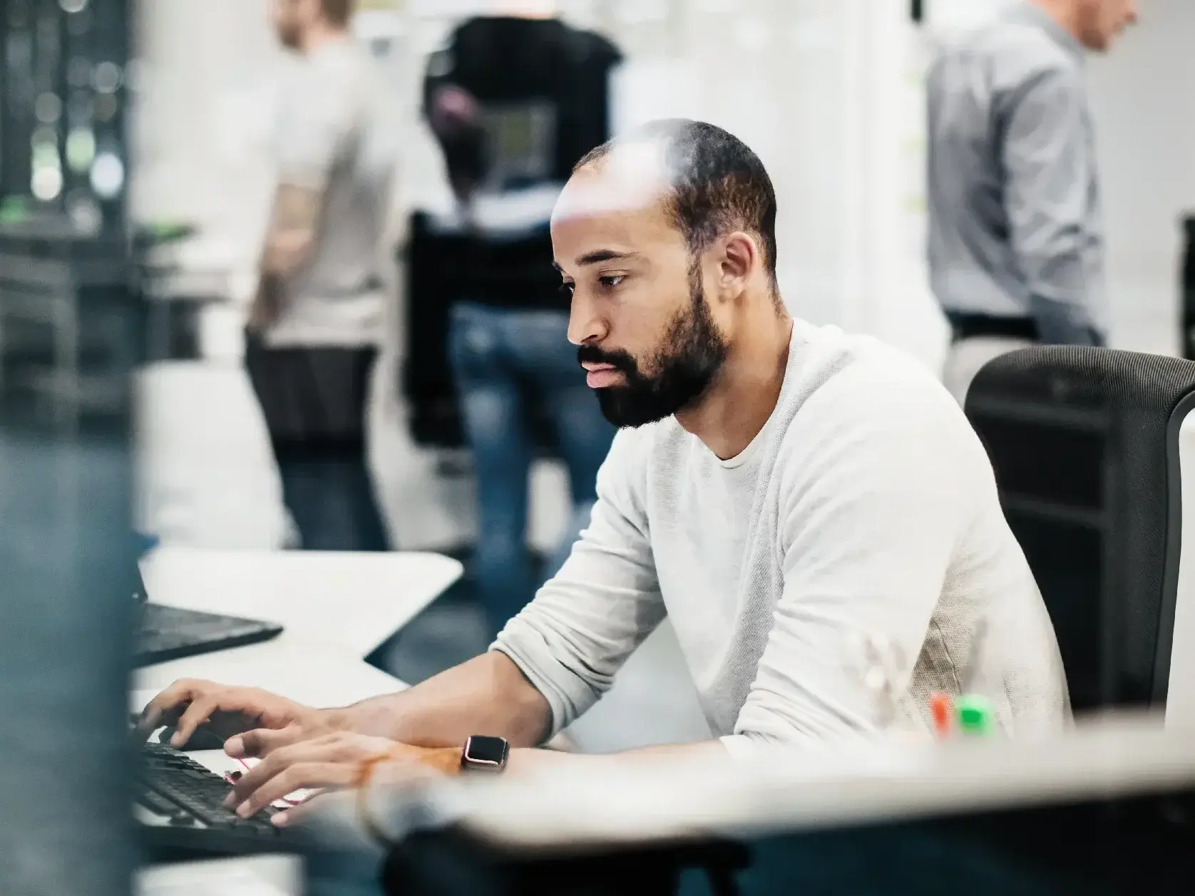 Man working on computer on far distance maintenance