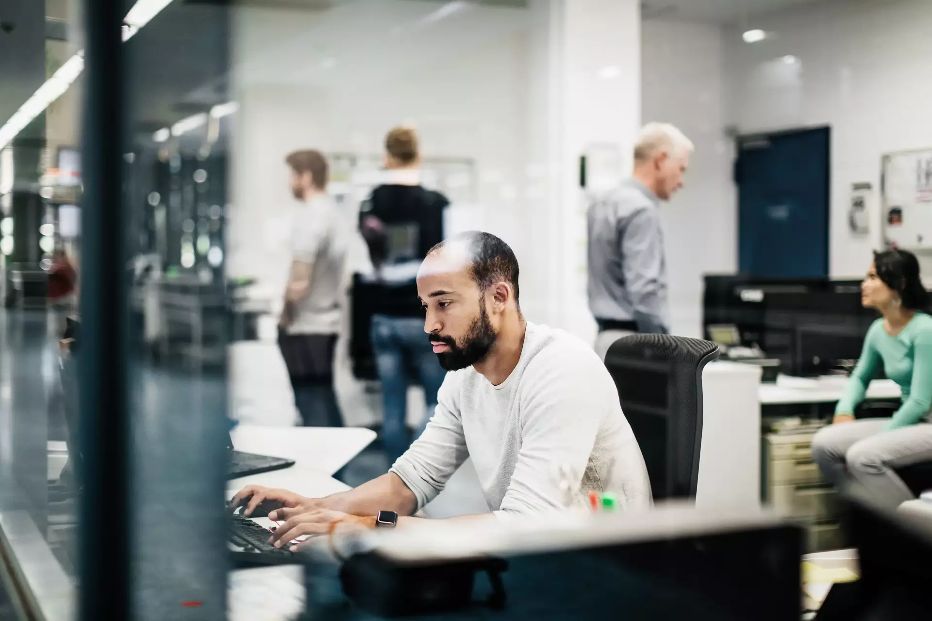 Man working on computer on far distance maintenance