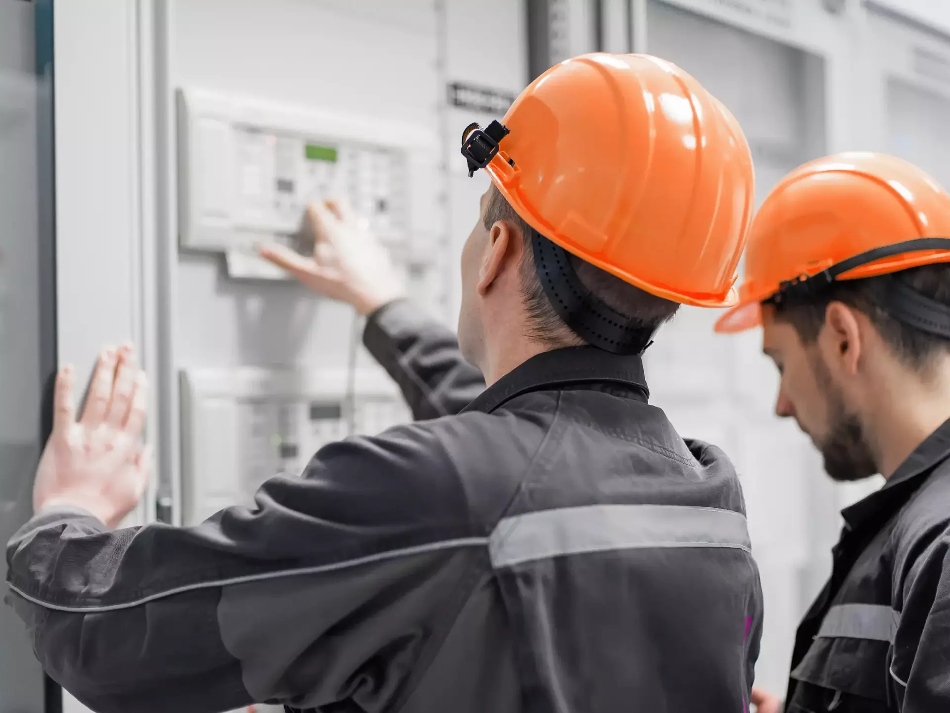 Field service crew testing electronics or inspecting electrical installation system