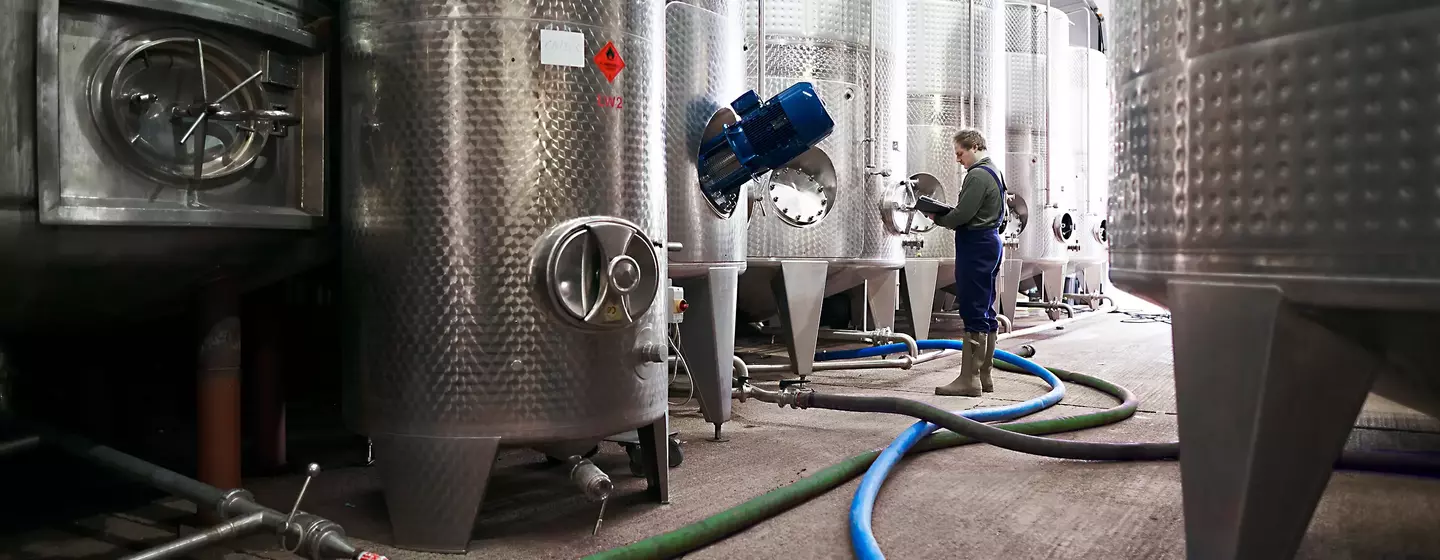 Workers at a distillery