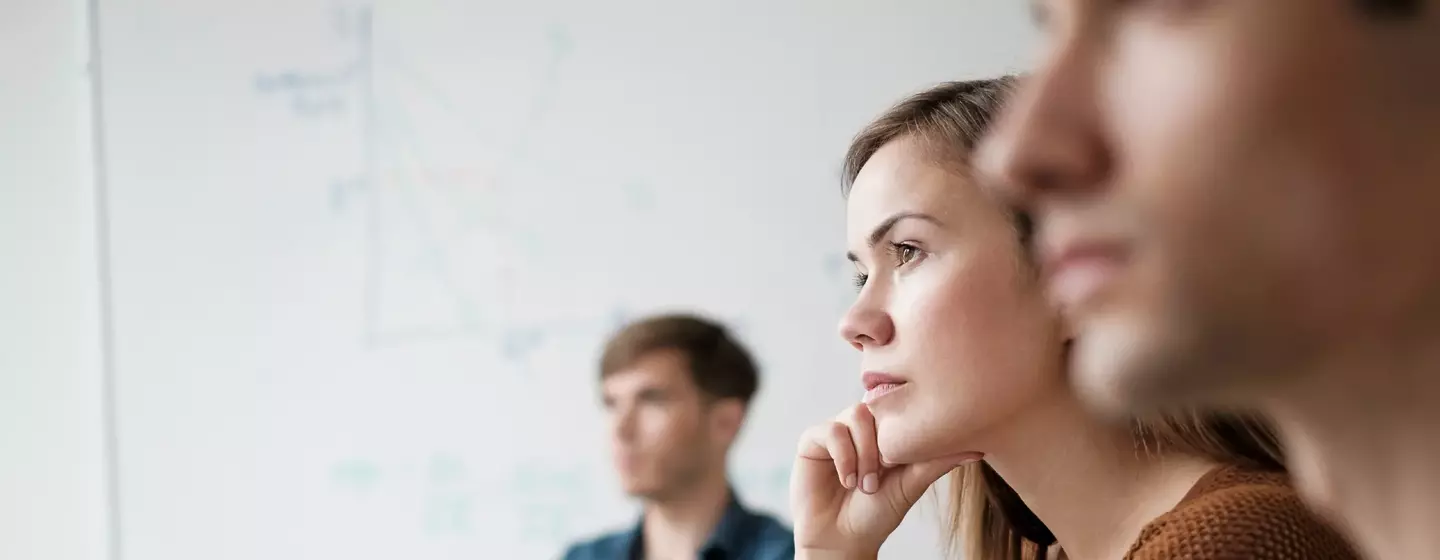 Student listening in college classroom