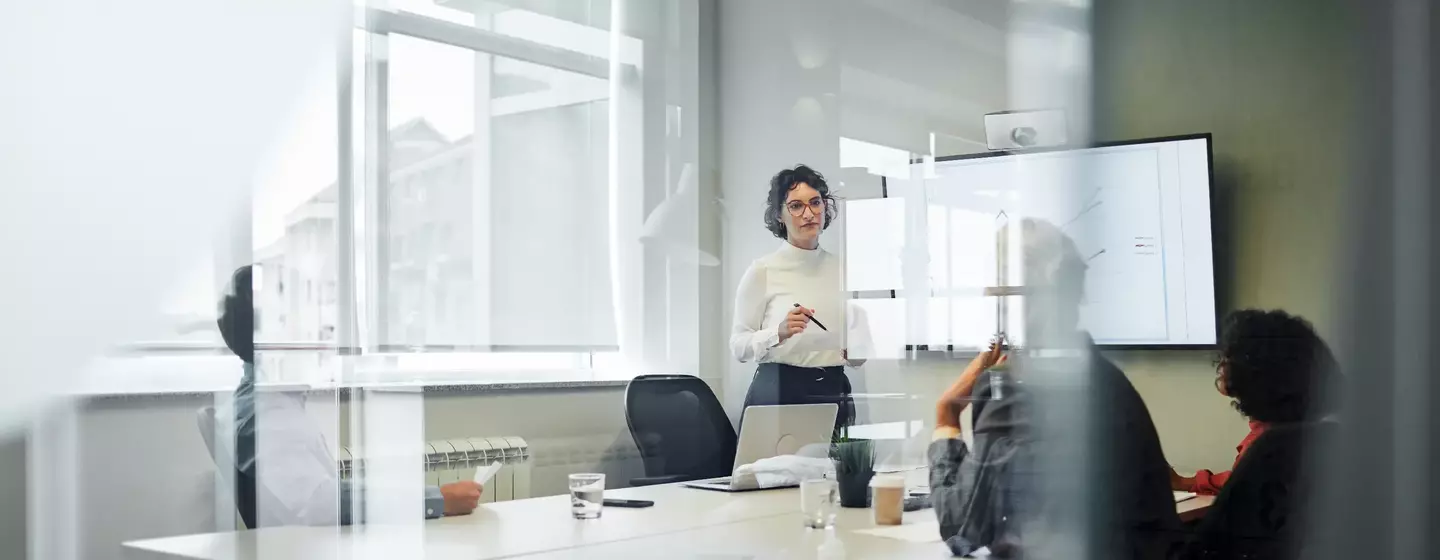 Woman presenting numbers for financial growth