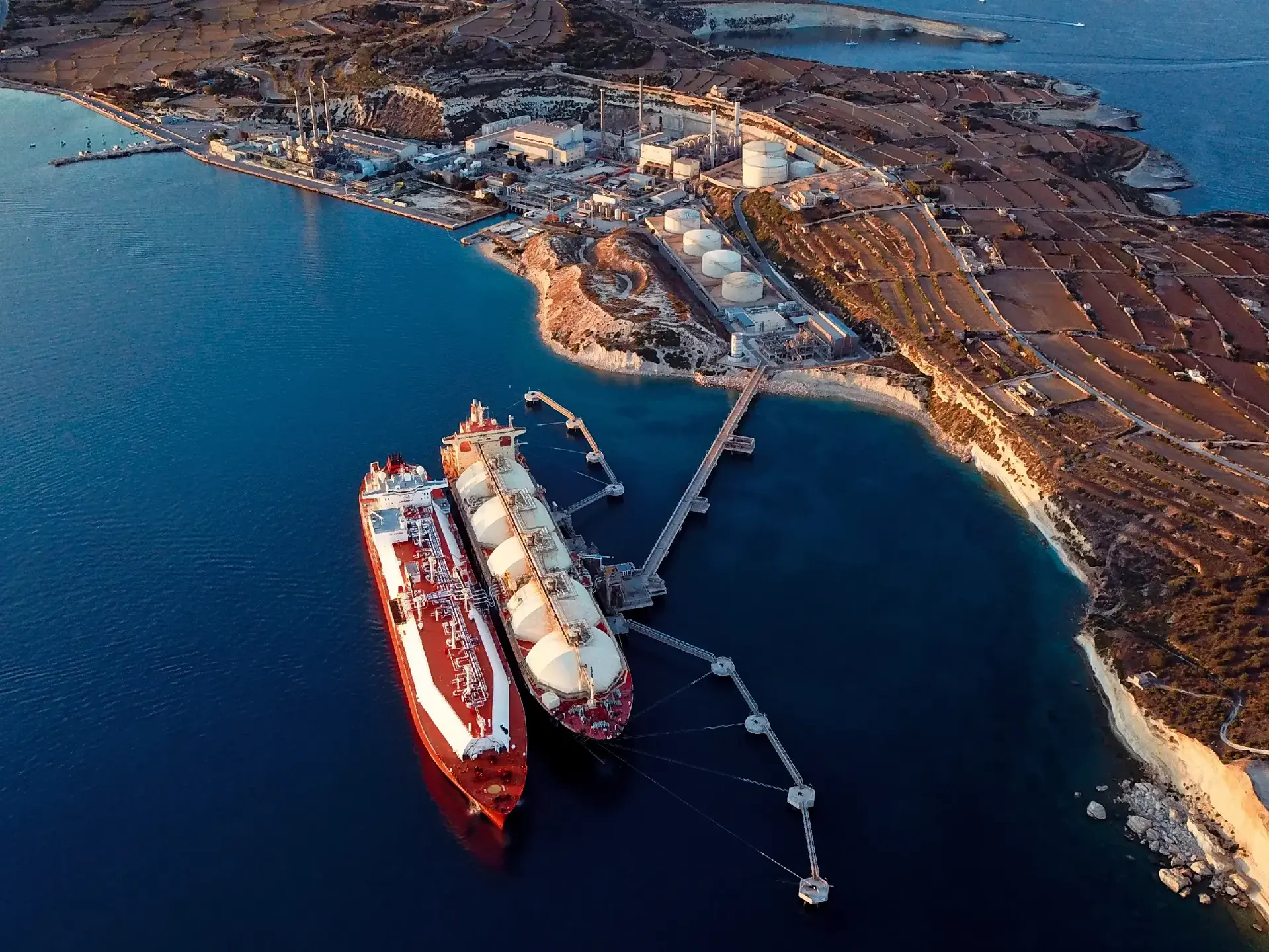 Aerial view of liquefied natural gas Ing tankers moored at harbour