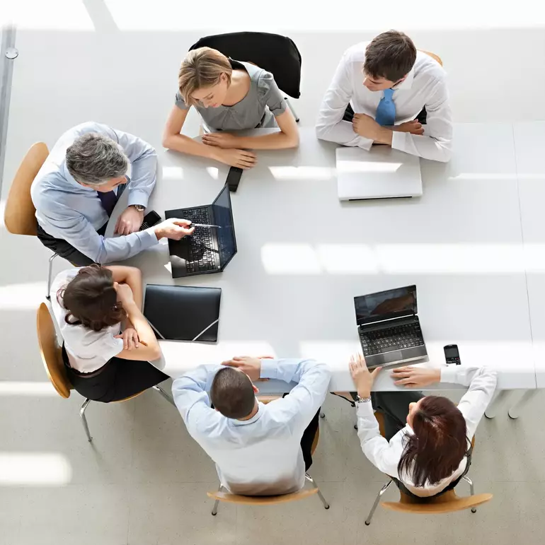 Overhead view of business people in a meeting