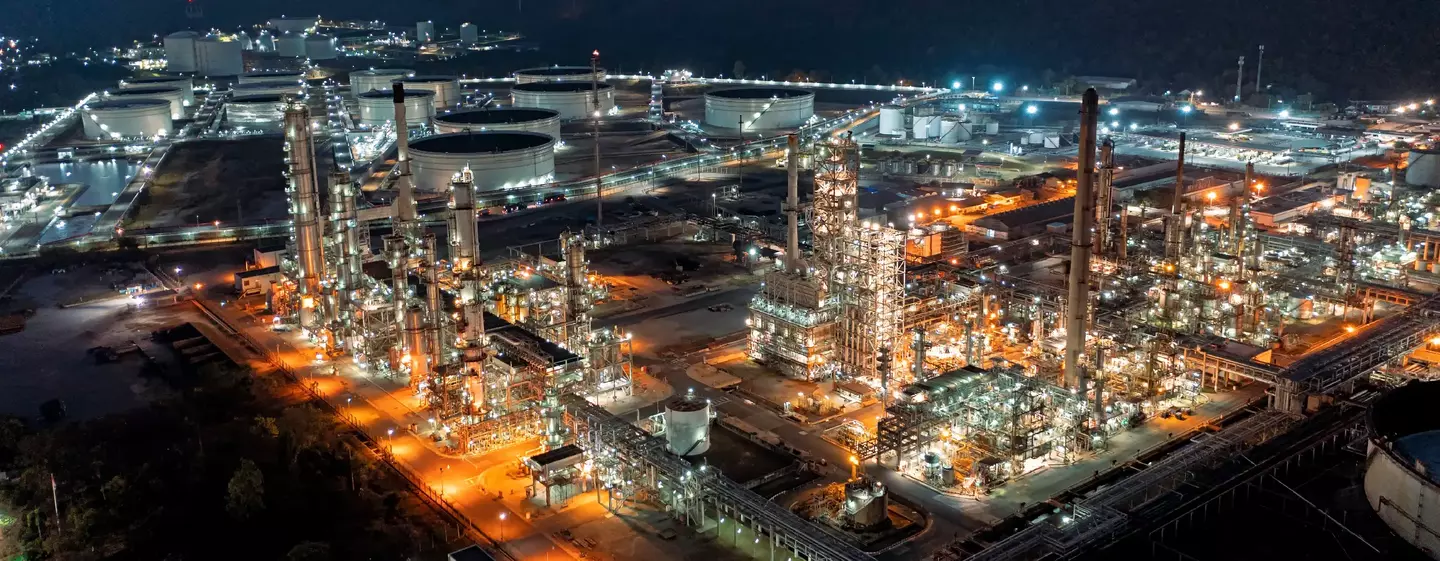 Aerial view of oil refinery at dusk