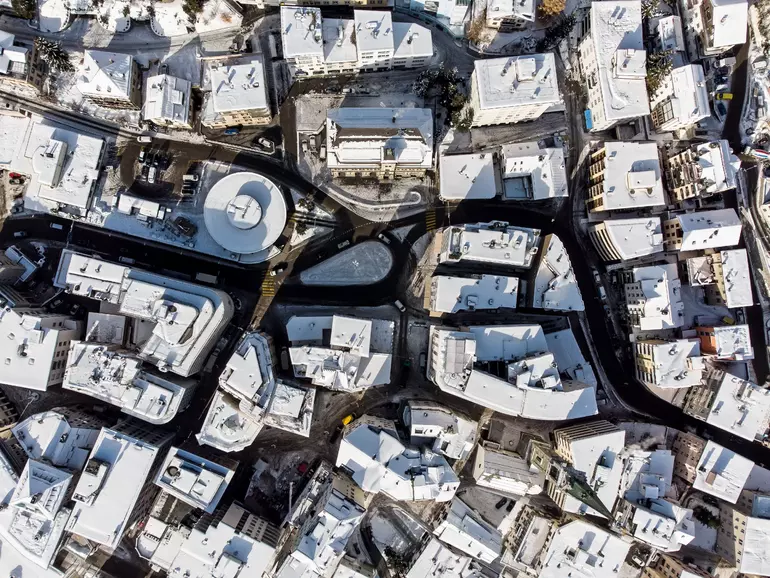 Overhead view of snow covered roofs switzerland