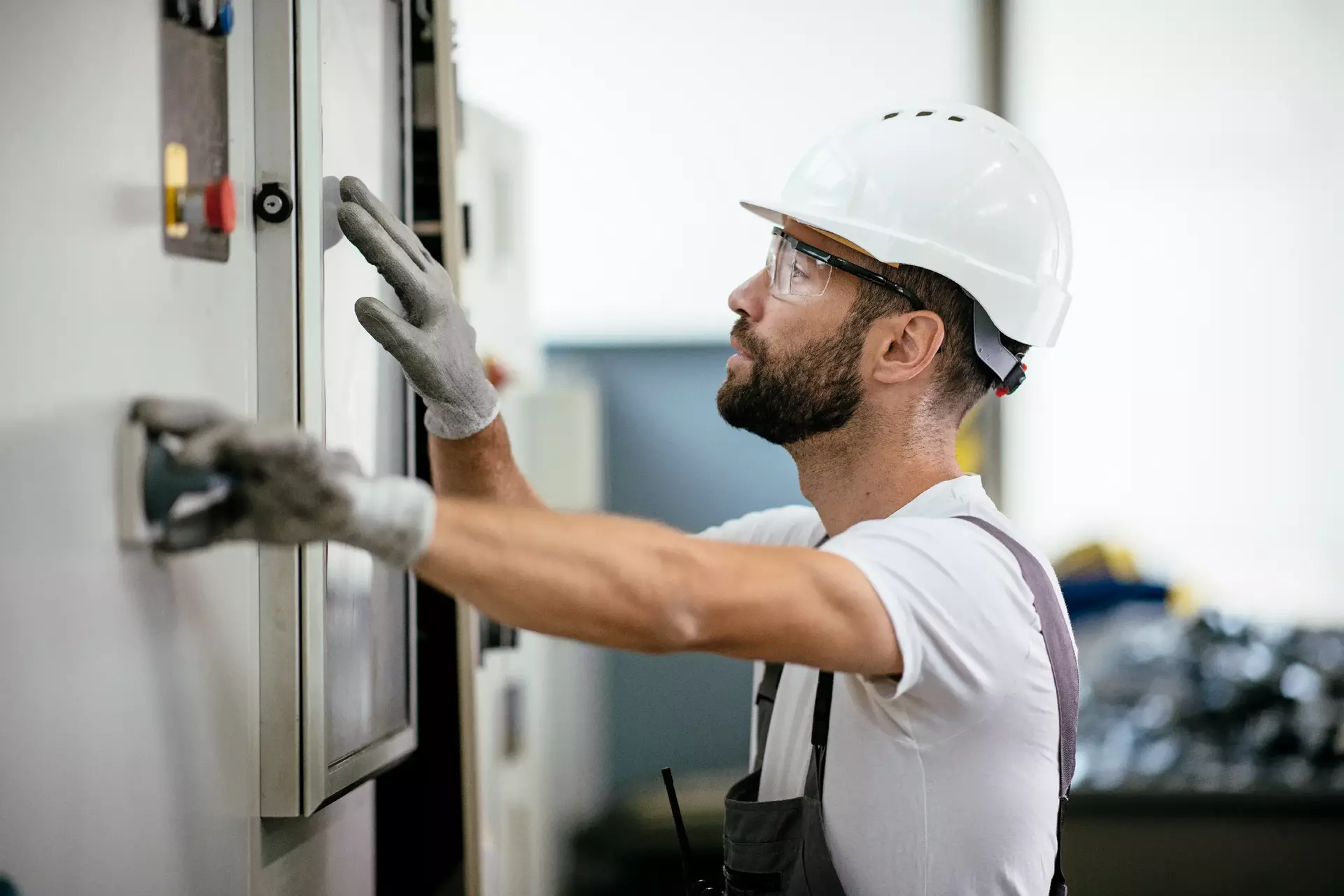Industrial technician operating in electricity substation